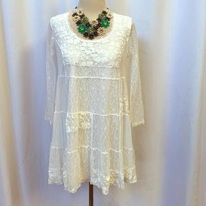 V. Cristina lace top, size M. Stretchy fabric and fully lined except sleeves.